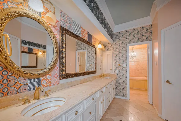 a bathroom with a tub a toilet and a shower