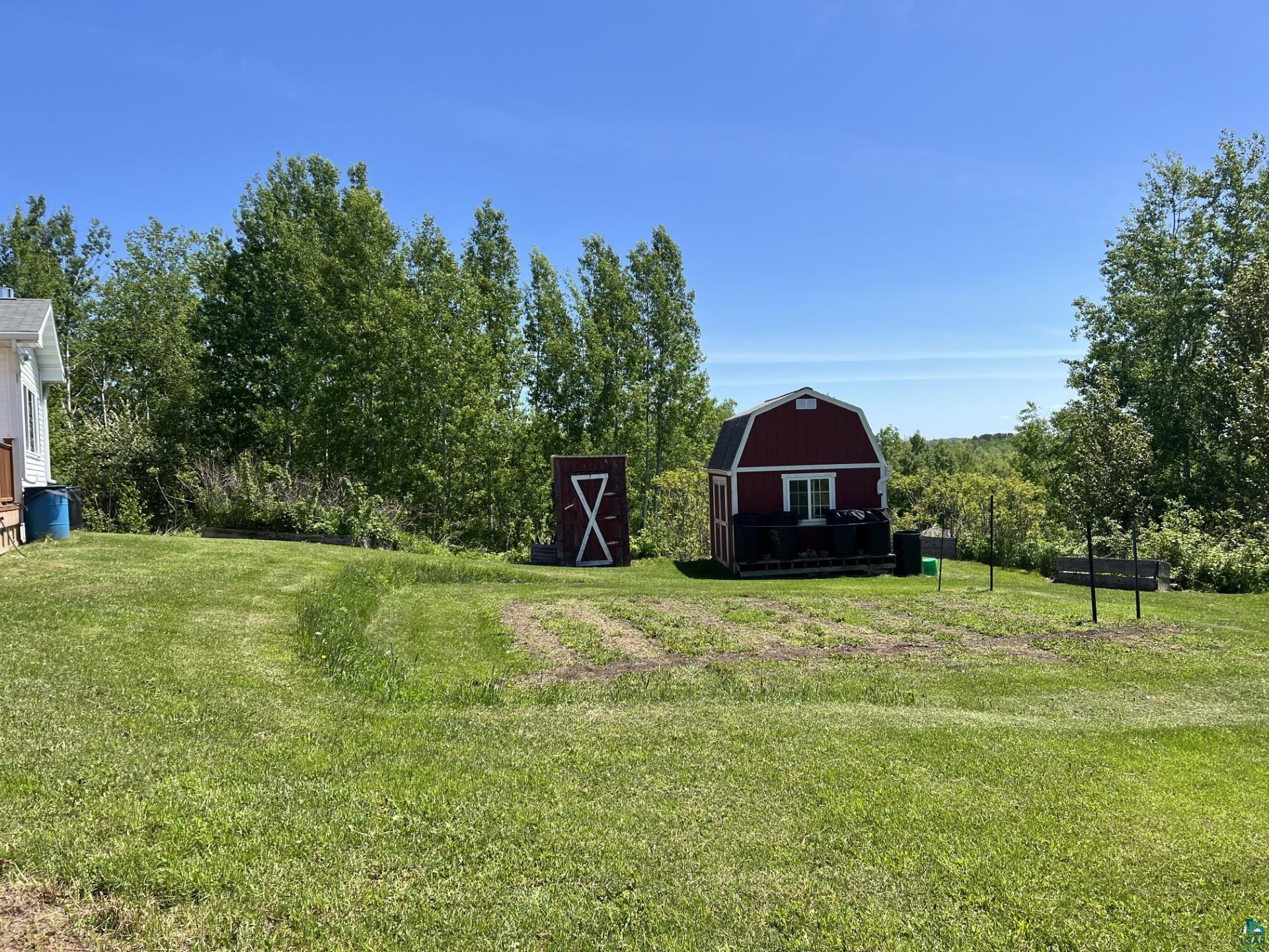 5144 Eagle Lake Road Duluth, MN 55803 - Photo 13 of 47 View of yard with an outdoor structure