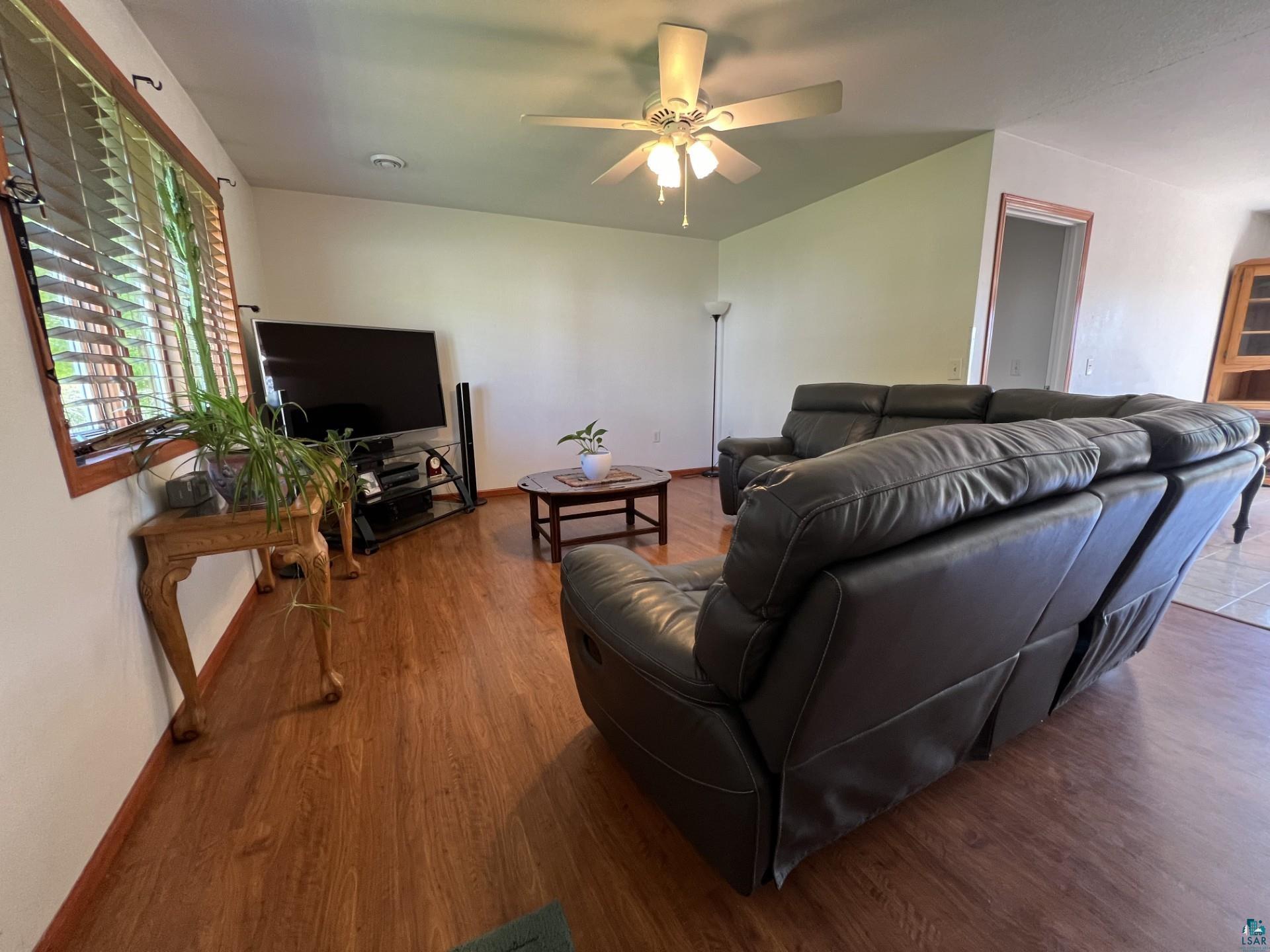 5144 Eagle Lake Road Duluth, MN 55803 - Photo 19 of 47 Living room featuring ceiling fan and hardwood / wood-style flooring