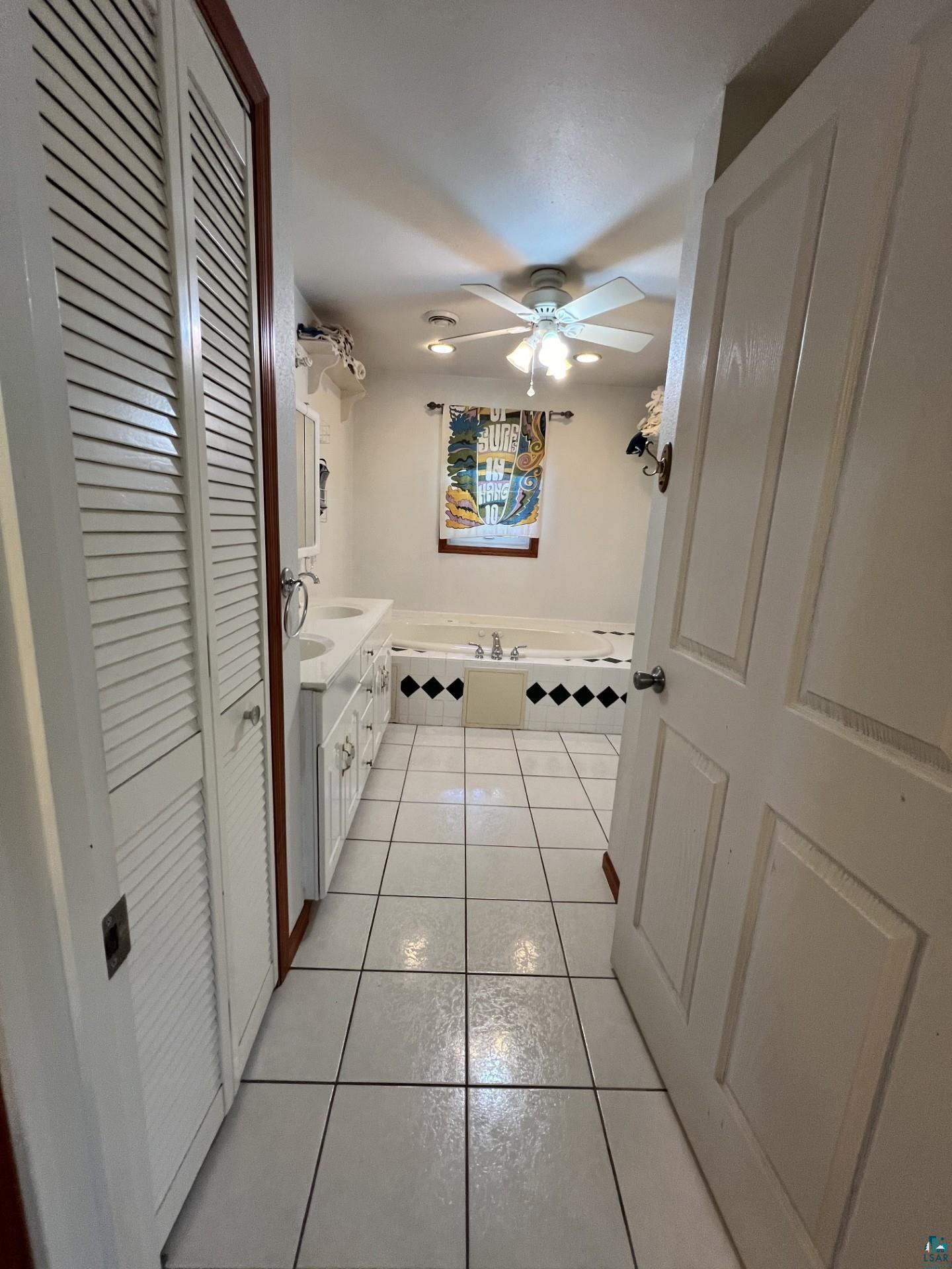 5144 Eagle Lake Road Duluth, MN 55803 - Photo 24 of 47 Corridor featuring light tile flooring
