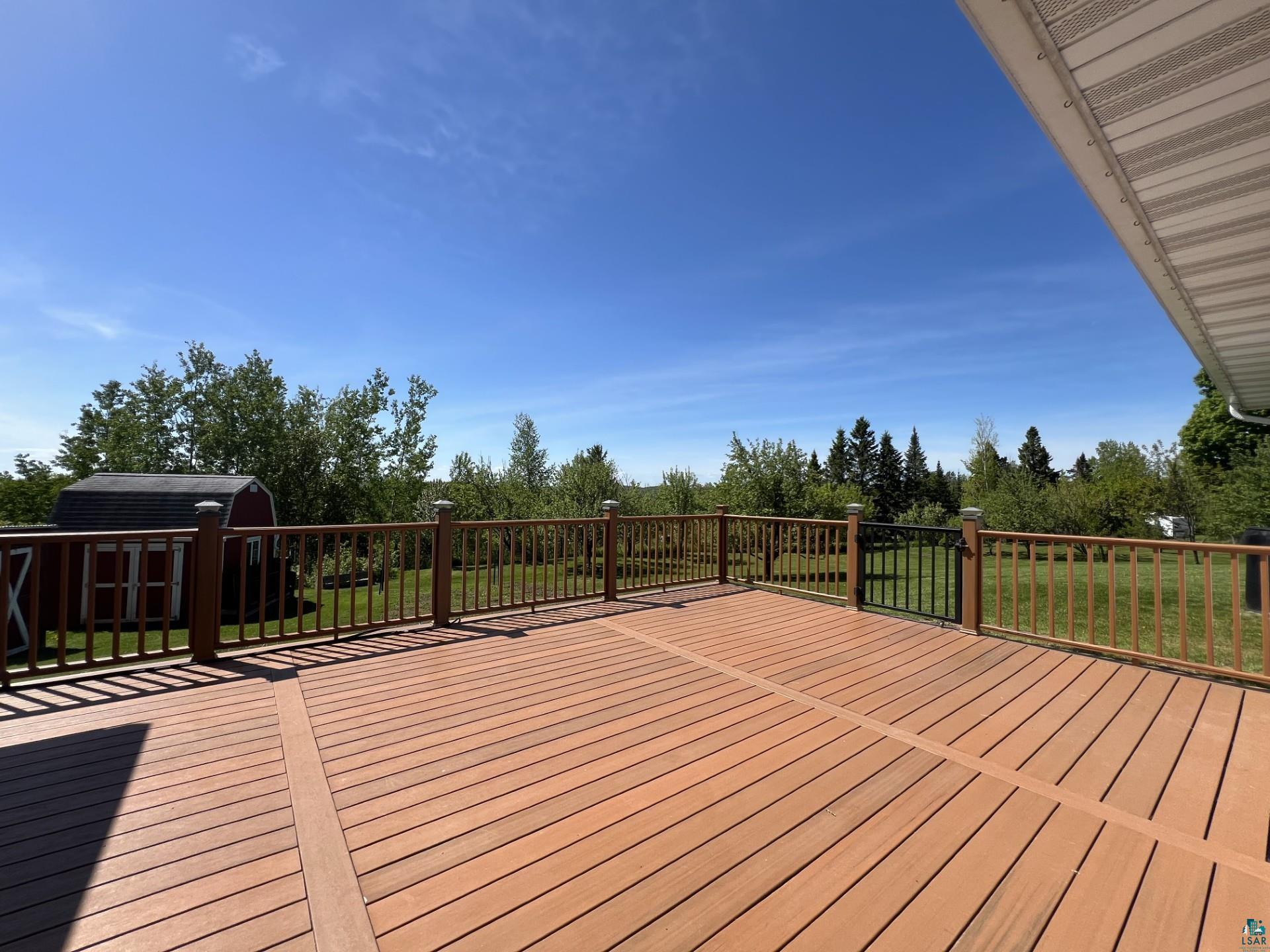 5144 Eagle Lake Road Duluth, MN 55803 - Photo 3 of 47 Wooden deck featuring a shed