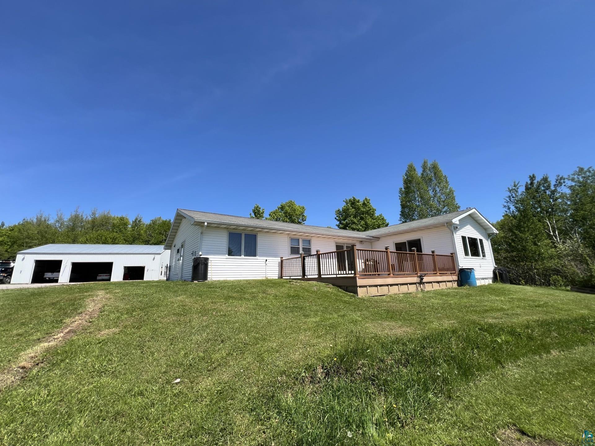 5144 Eagle Lake Road Duluth, MN 55803 - Photo 44 of 47 View of front facade with a front lawn and a deck