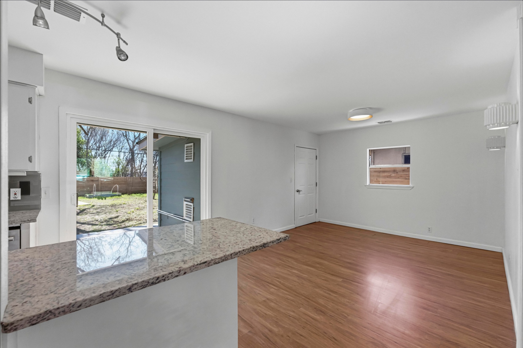 1005 Arthur Stiles Road Austin, TX 78721 - Photo 7 of 29 Energy-efficient double pane windows, sliding door.