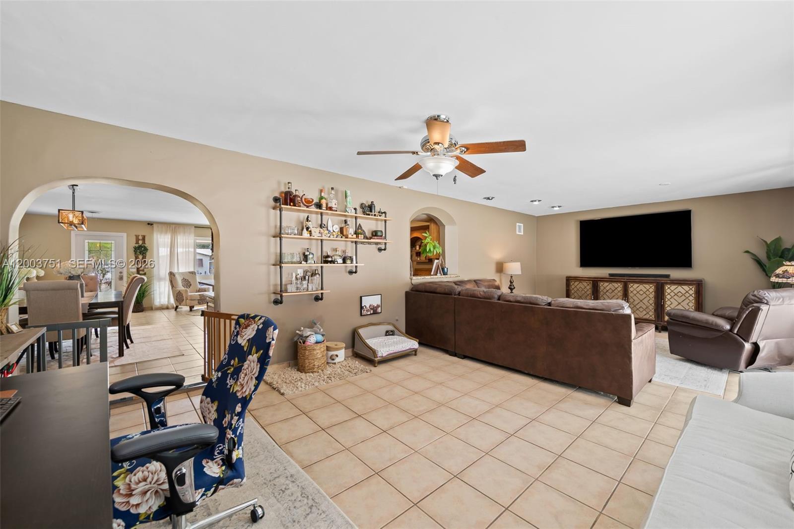 1925 North 39th Avenue Hollywood, FL 33021 - Photo 12 of 20 a living room with furniture and a flat screen tv