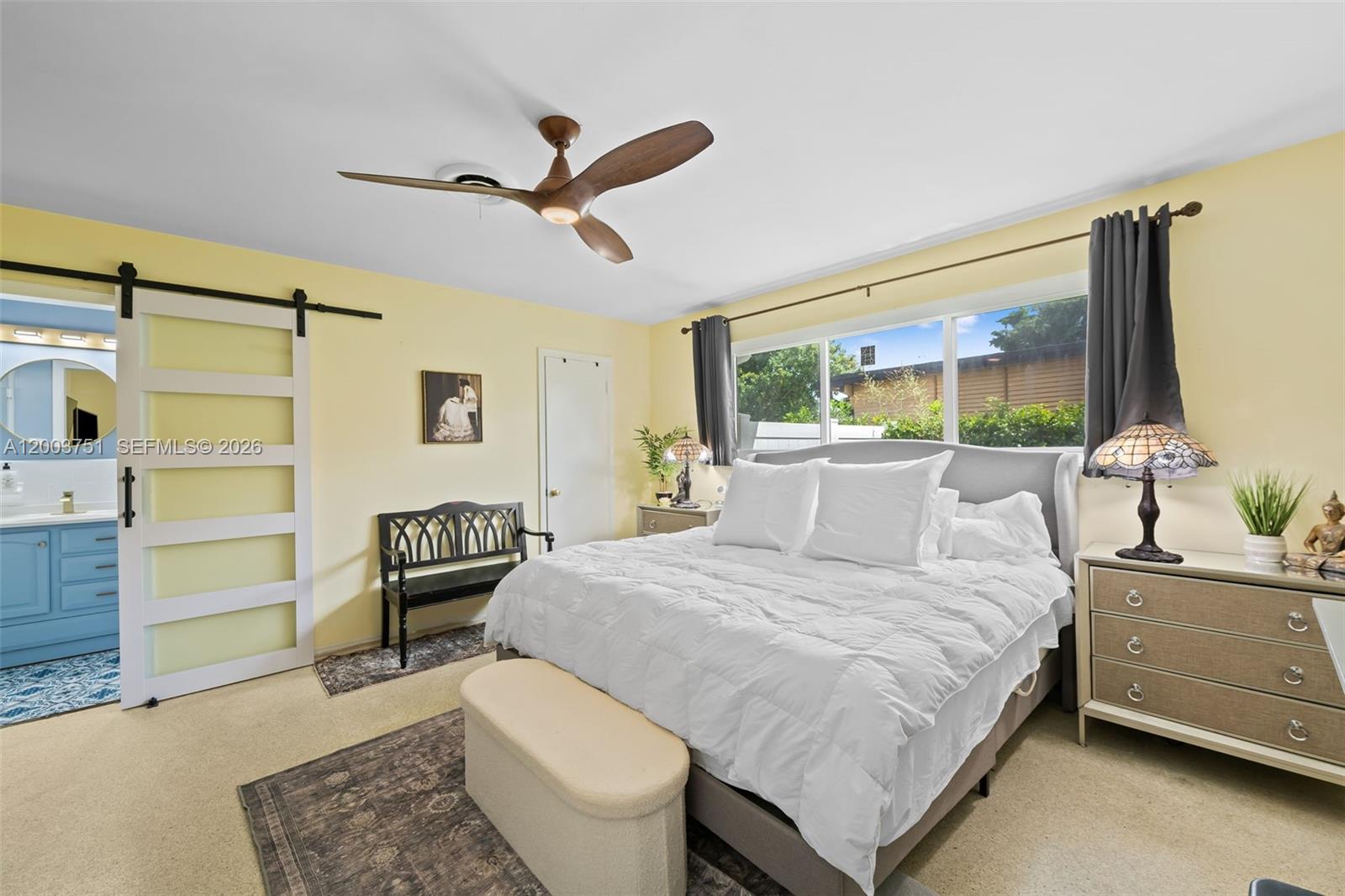 1925 North 39th Avenue Hollywood, FL 33021 - Photo 15 of 20 a bedroom with a bed and wooden floor