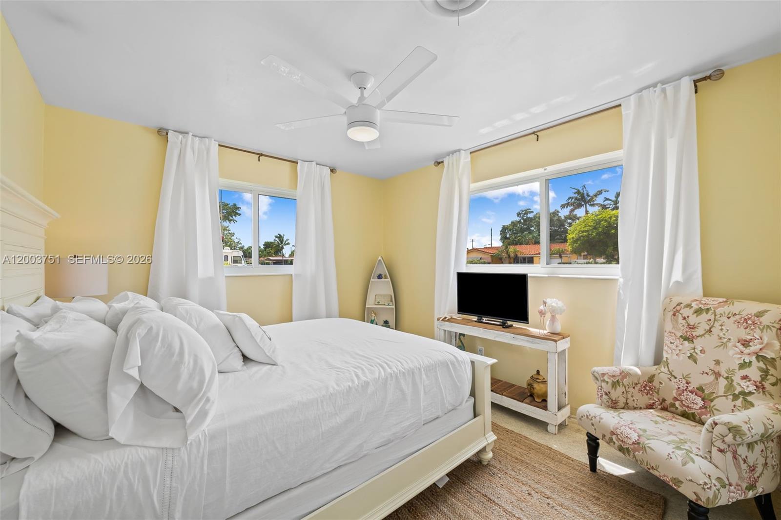 1925 North 39th Avenue Hollywood, FL 33021 - Photo 18 of 20 a bedroom with a bed and a flat screen tv