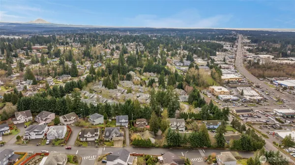 an aerial view of residential building with parking space