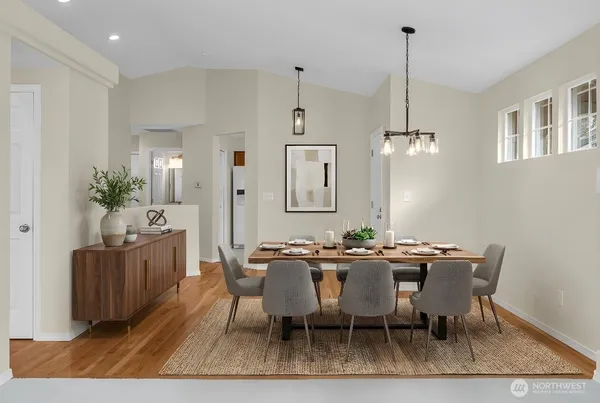 a view of a dining room with furniture