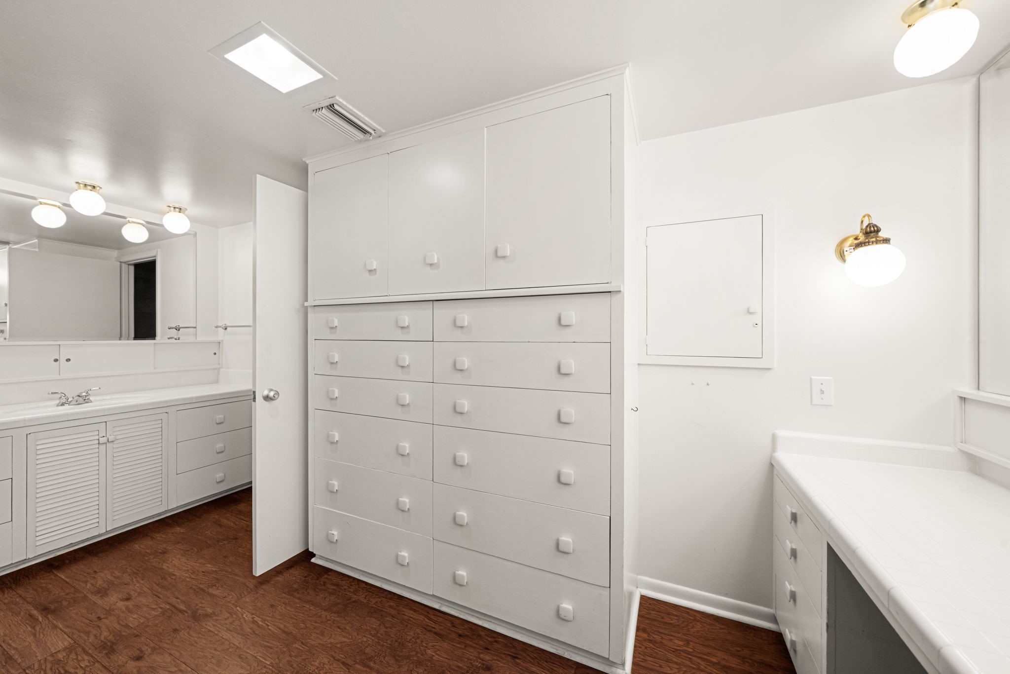 1908 Milam Street Columbus, TX 78934 - Photo 19 of 39 a bathroom with a sink vanity and mirror