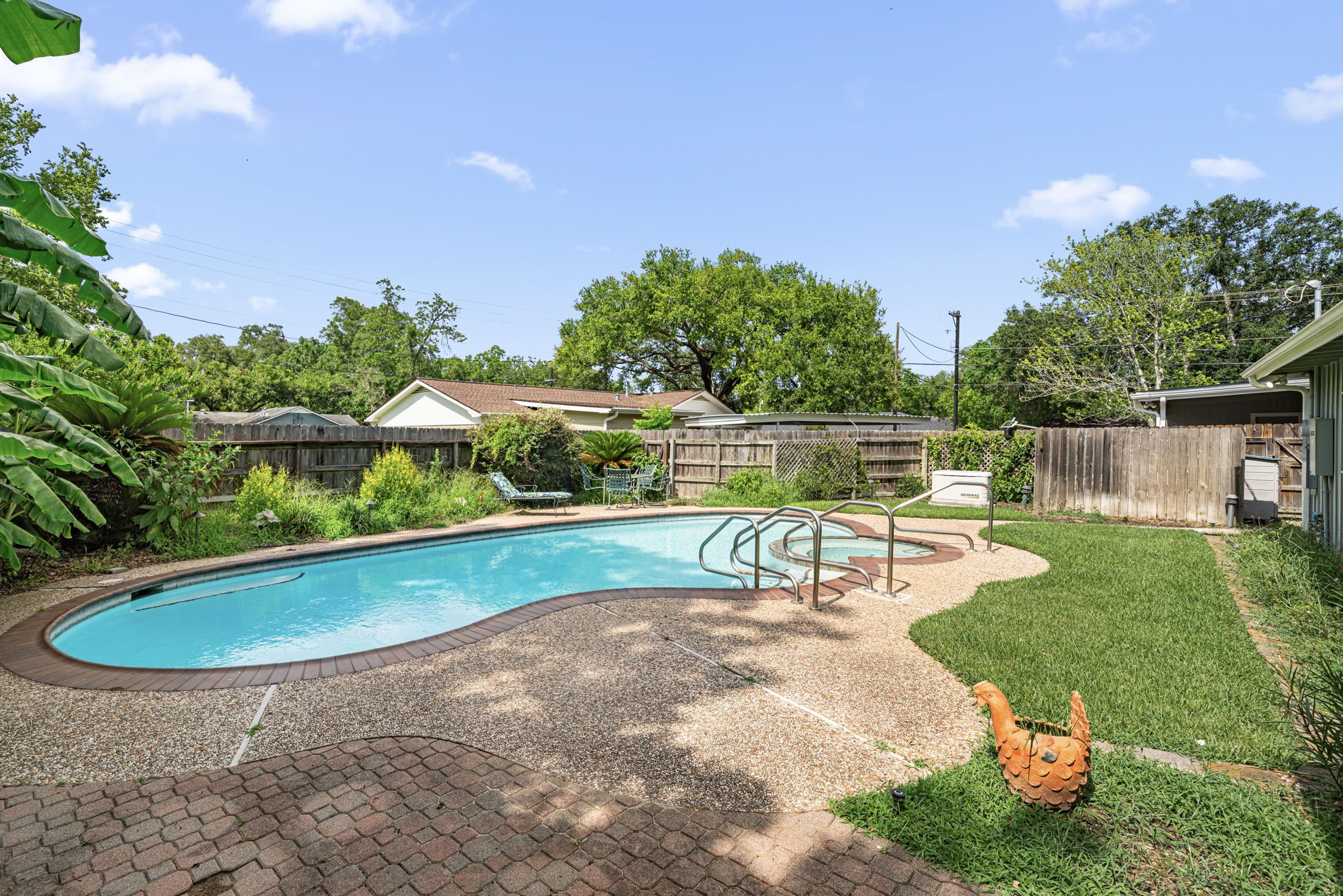 1908 Milam Street Columbus, TX 78934 - Photo 35 of 39 a view of a swimming pool with a patio