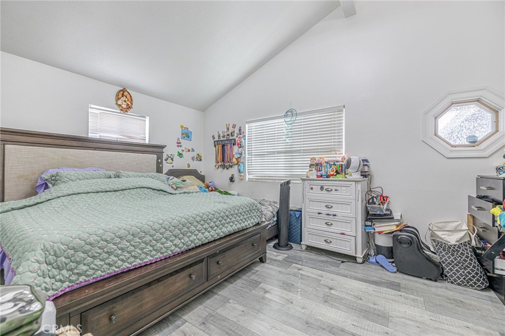 2078 Swindon Avenue Simi Valley, CA 93063 - Photo 17 of 44 a bedroom with a bed and a cabinets