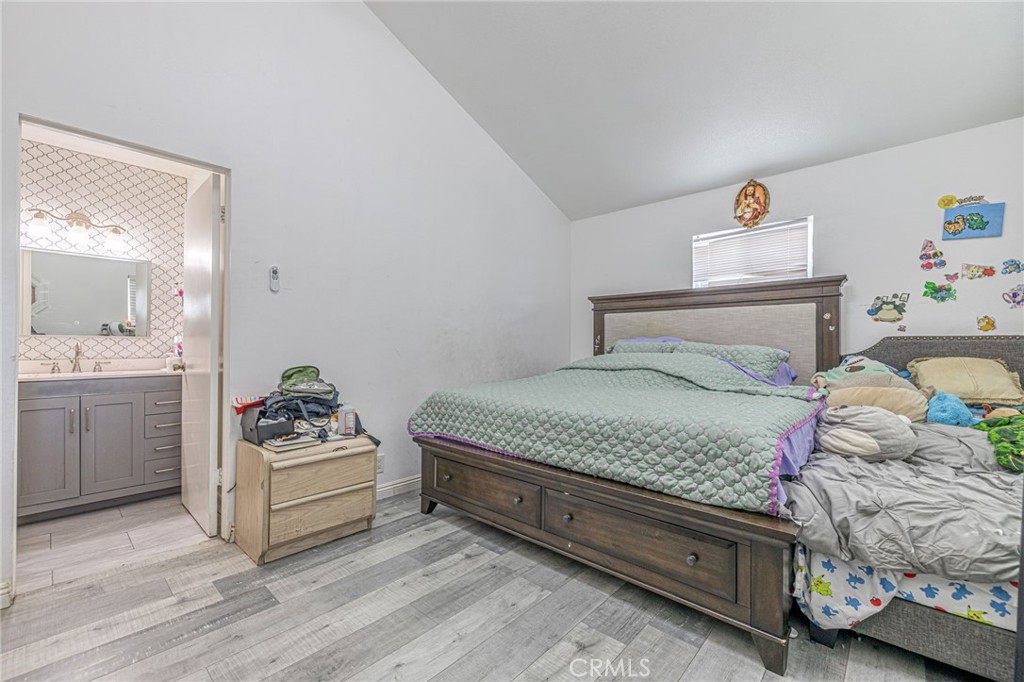 2078 Swindon Avenue Simi Valley, CA 93063 - Photo 18 of 44 a bedroom with a bed and a couch