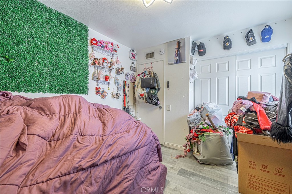 2078 Swindon Avenue Simi Valley, CA 93063 - Photo 25 of 44 a bed sitting in a bedroom next to a window