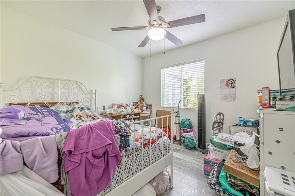 2078 Swindon Avenue Simi Valley, CA 93063 - Photo 26 of 44 a bedroom with bed and a window