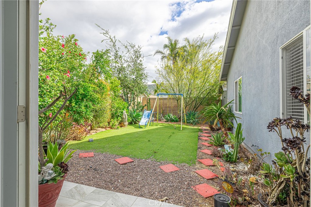 2078 Swindon Avenue Simi Valley, CA 93063 - Photo 29 of 44 a view of a garden with a fountain