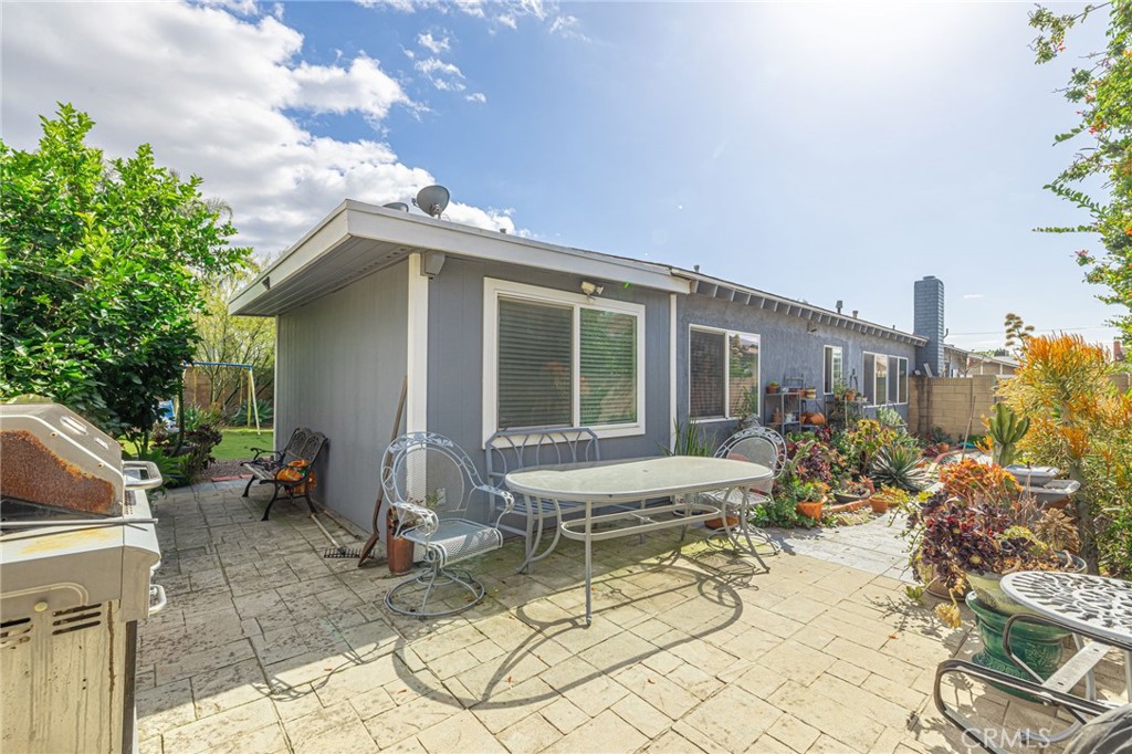 2078 Swindon Avenue Simi Valley, CA 93063 - Photo 32 of 44 a backyard of a house with table and chairs