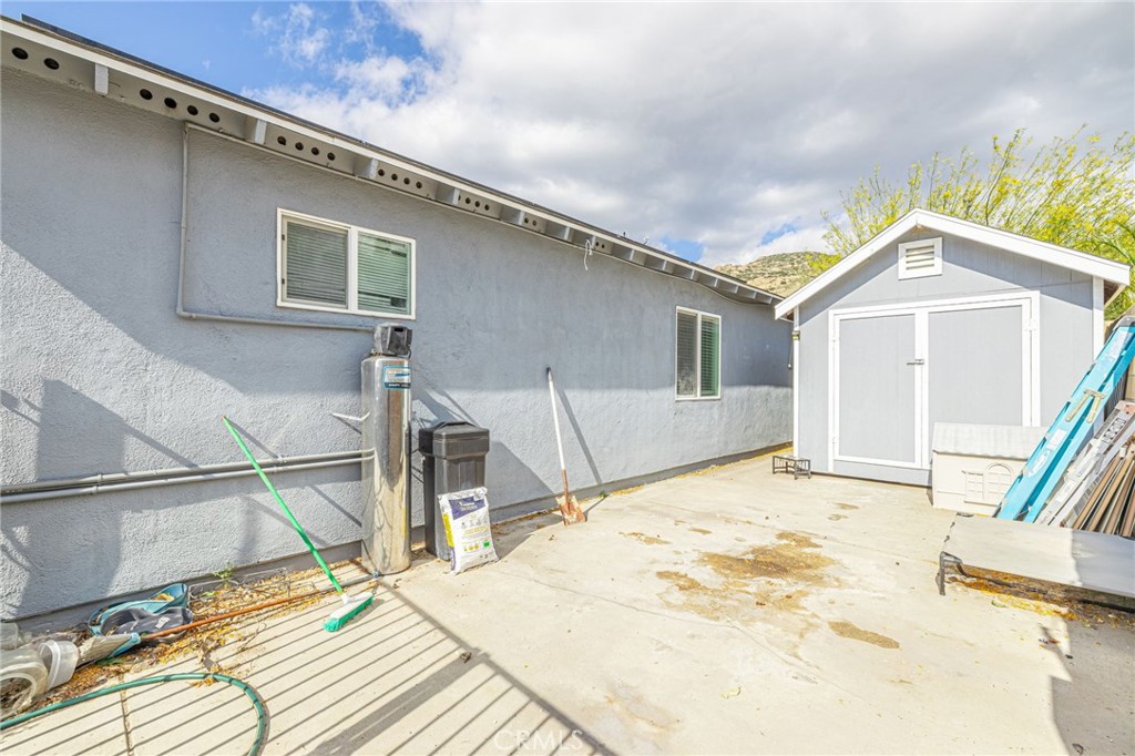 2078 Swindon Avenue Simi Valley, CA 93063 - Photo 40 of 44 a bedroom with a bed and a flat screen tv