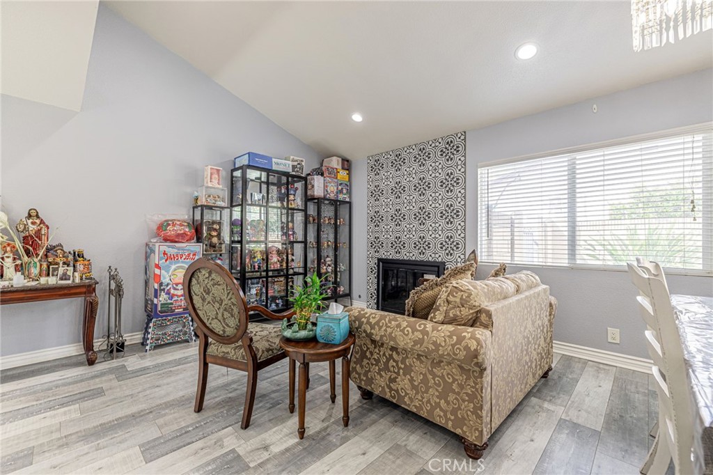 2078 Swindon Avenue Simi Valley, CA 93063 - Photo 4 of 44 a living room with furniture and a fireplace