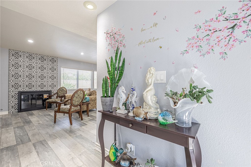 2078 Swindon Avenue Simi Valley, CA 93063 - Photo 43 of 44 a living room with furniture flowerpot and wooden floor