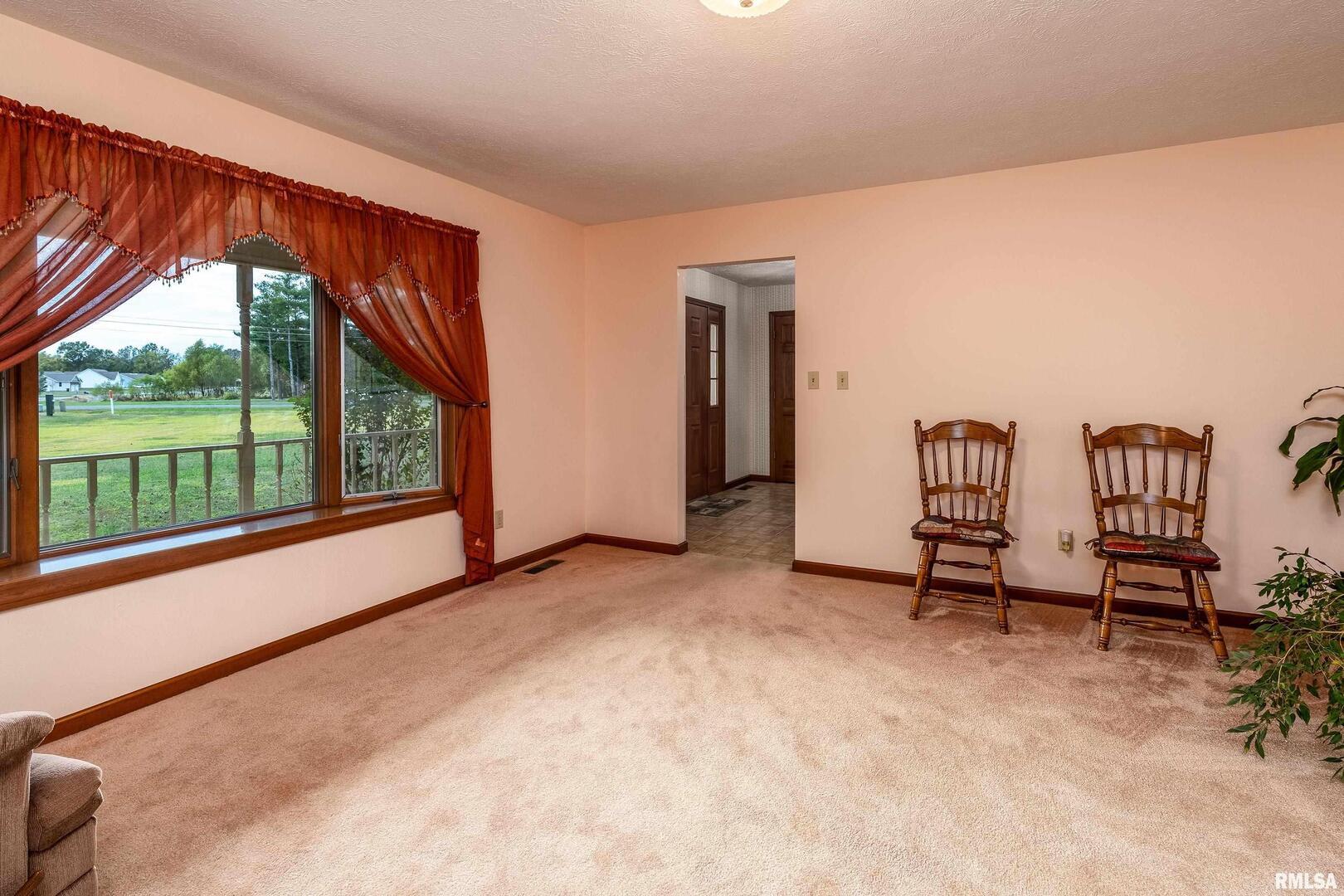 11688 Strawberry Road Carbondale, IL 62901 - Photo 13 of 36 a view of a room with furniture water view and windows
