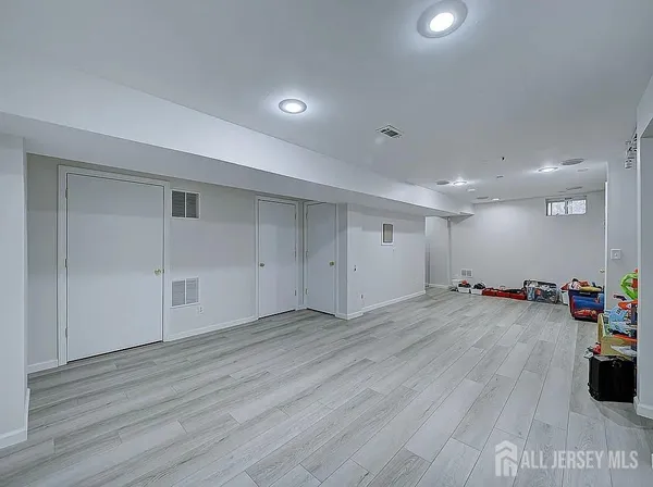 a view of a livingroom with wooden floor