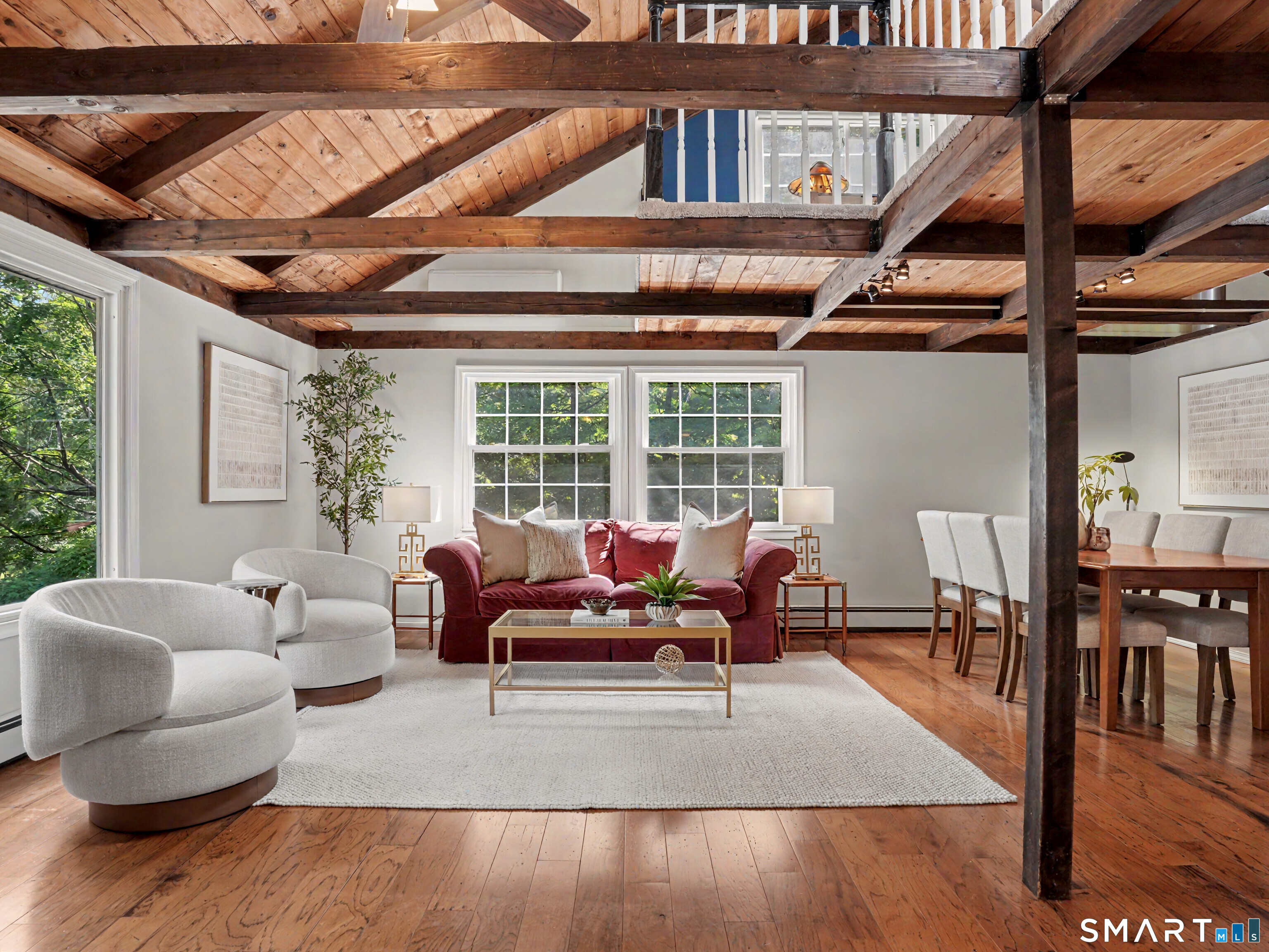 252 Bennetts Farm Road Ridgefield, CT 06877 - Photo 2 of 40 The main level is designed around an open-concept flow with soaring cathedral ceilings.