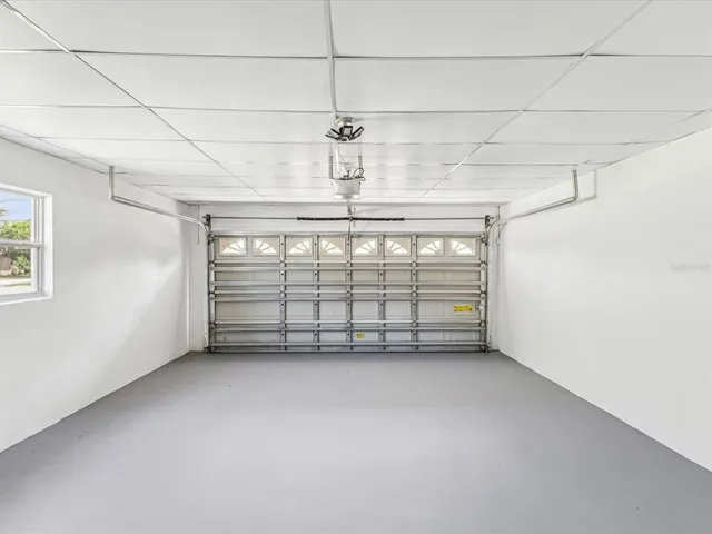 a view of empty room with windows