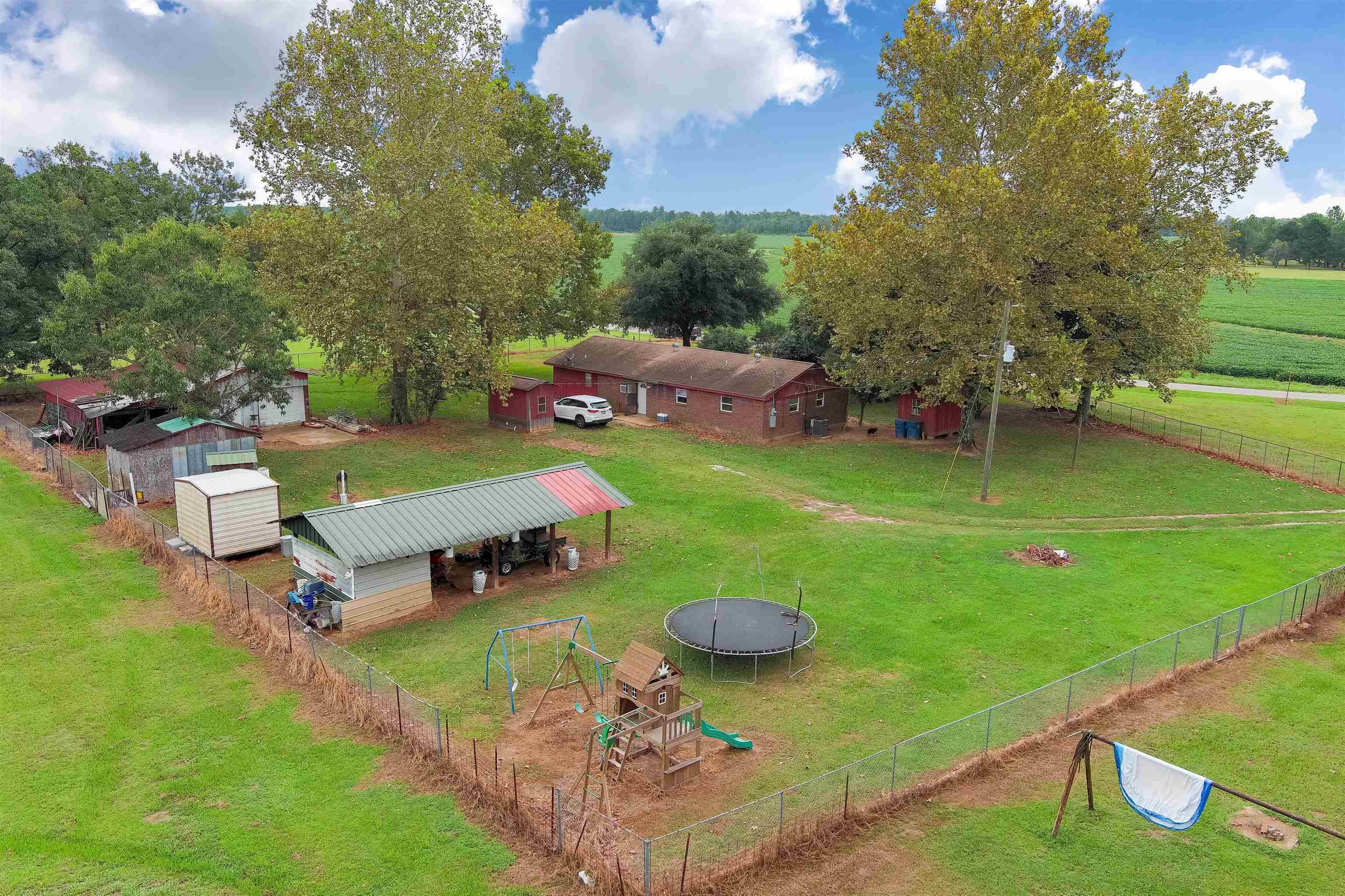 1147 Mack Pond Road Atmore, AL 36502 - Photo 1 of 40 Drone / aerial view with a rural view