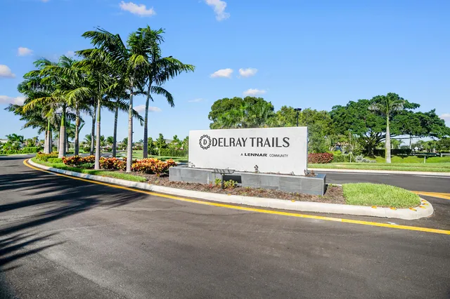 a view of a park with palm trees