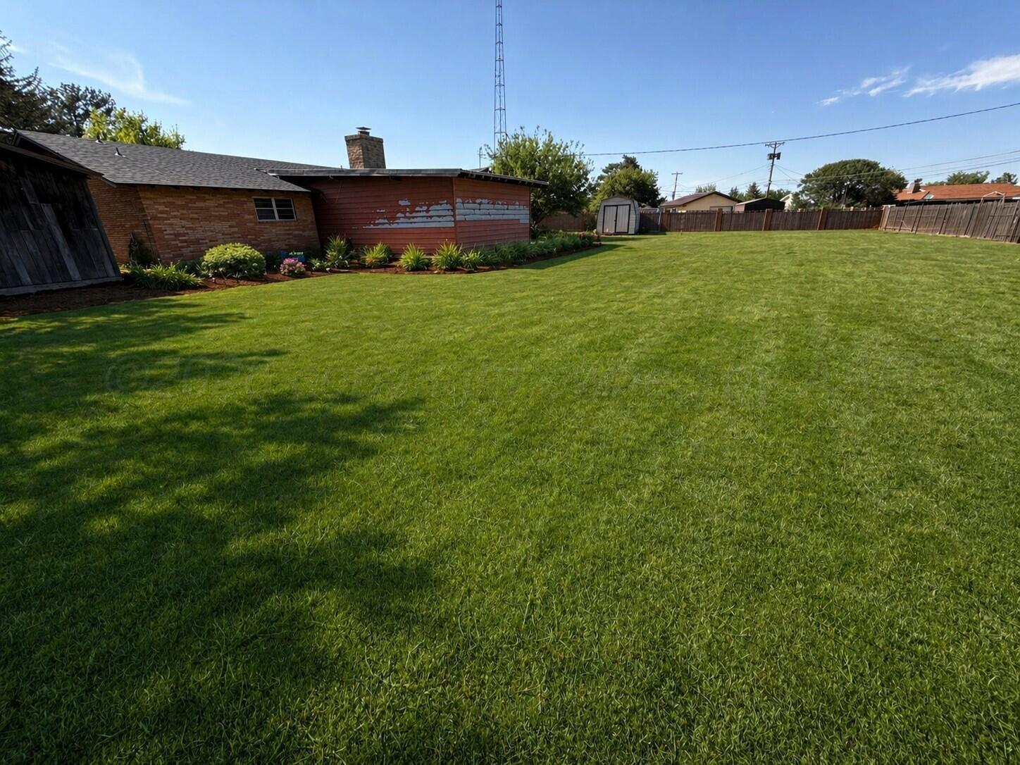 613 South Pearl Street Stratford, TX 79084 - Photo 32 of 32 virtual landscaped backyard