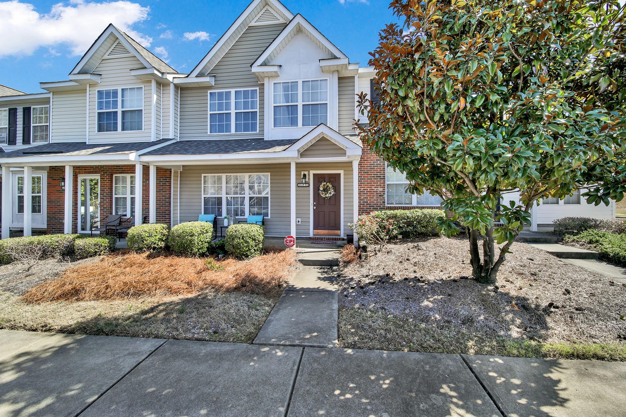 11223 Grass Field Road Charlotte, NC 28213 - Photo 2 of 25 a front view of a house with a yard