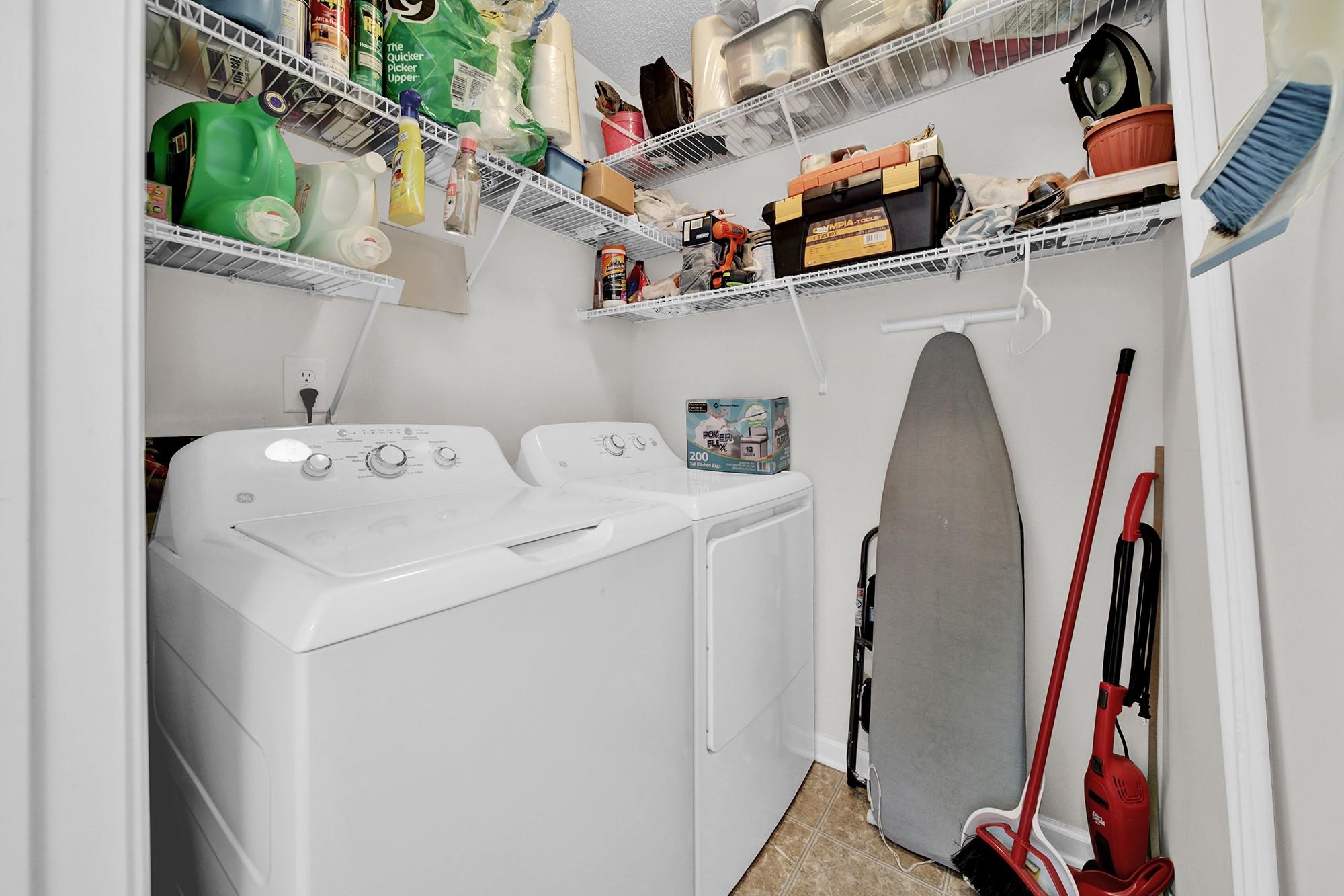 11223 Grass Field Road Charlotte, NC 28213 - Photo 21 of 25 a utility room with dryer and washer
