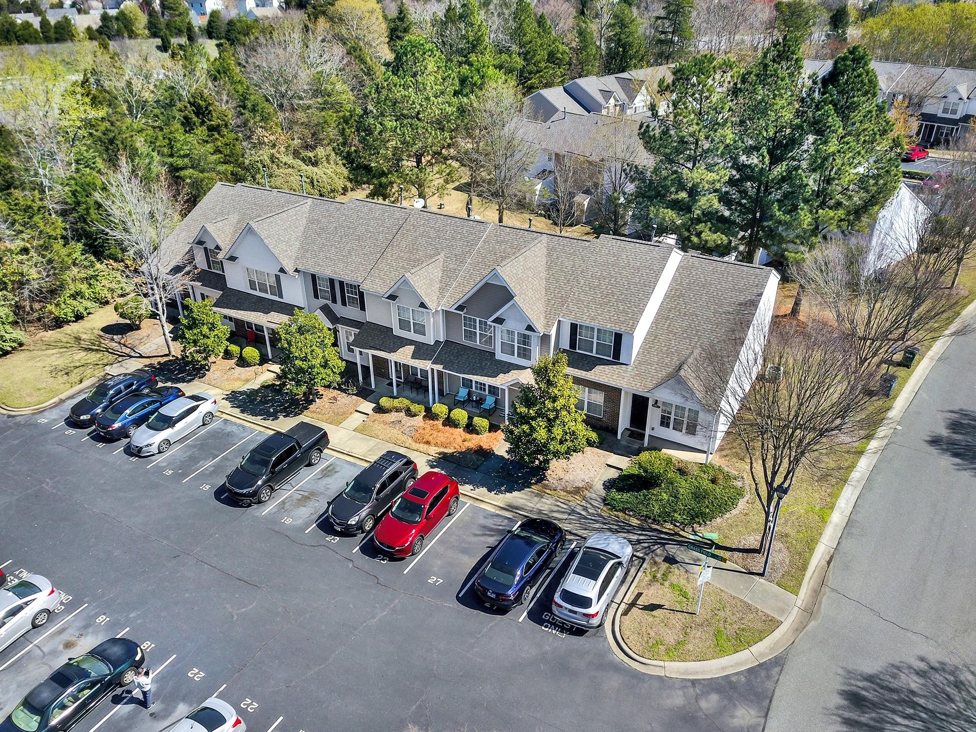11223 Grass Field Road Charlotte, NC 28213 - Photo 25 of 25 an aerial view of a house with swimming pool and outdoor seating