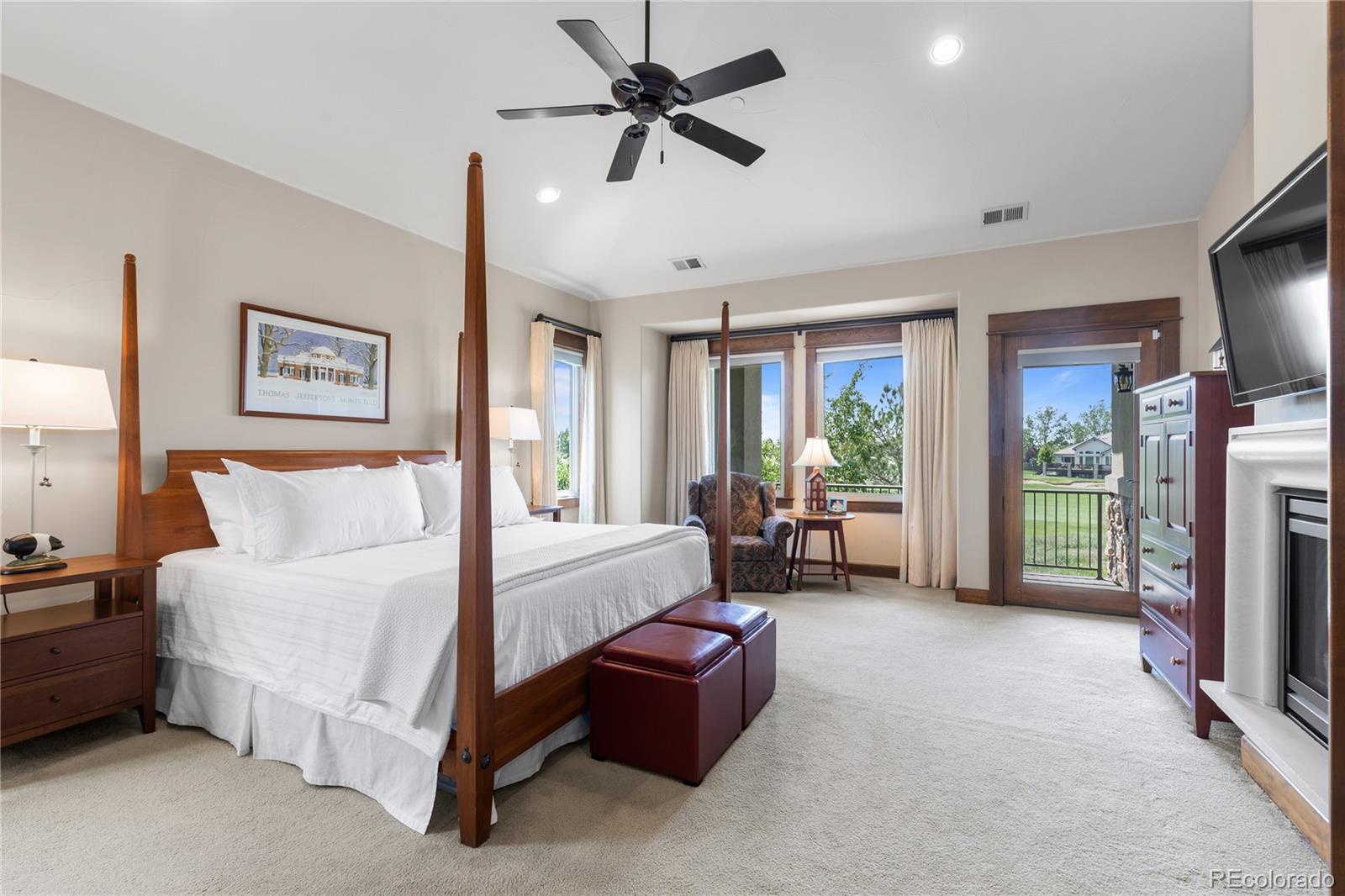 1291 Buffalo Ridge Road Castle Pines, CO 80108 - Photo 19 of 39 a living room with furniture and a chandelier