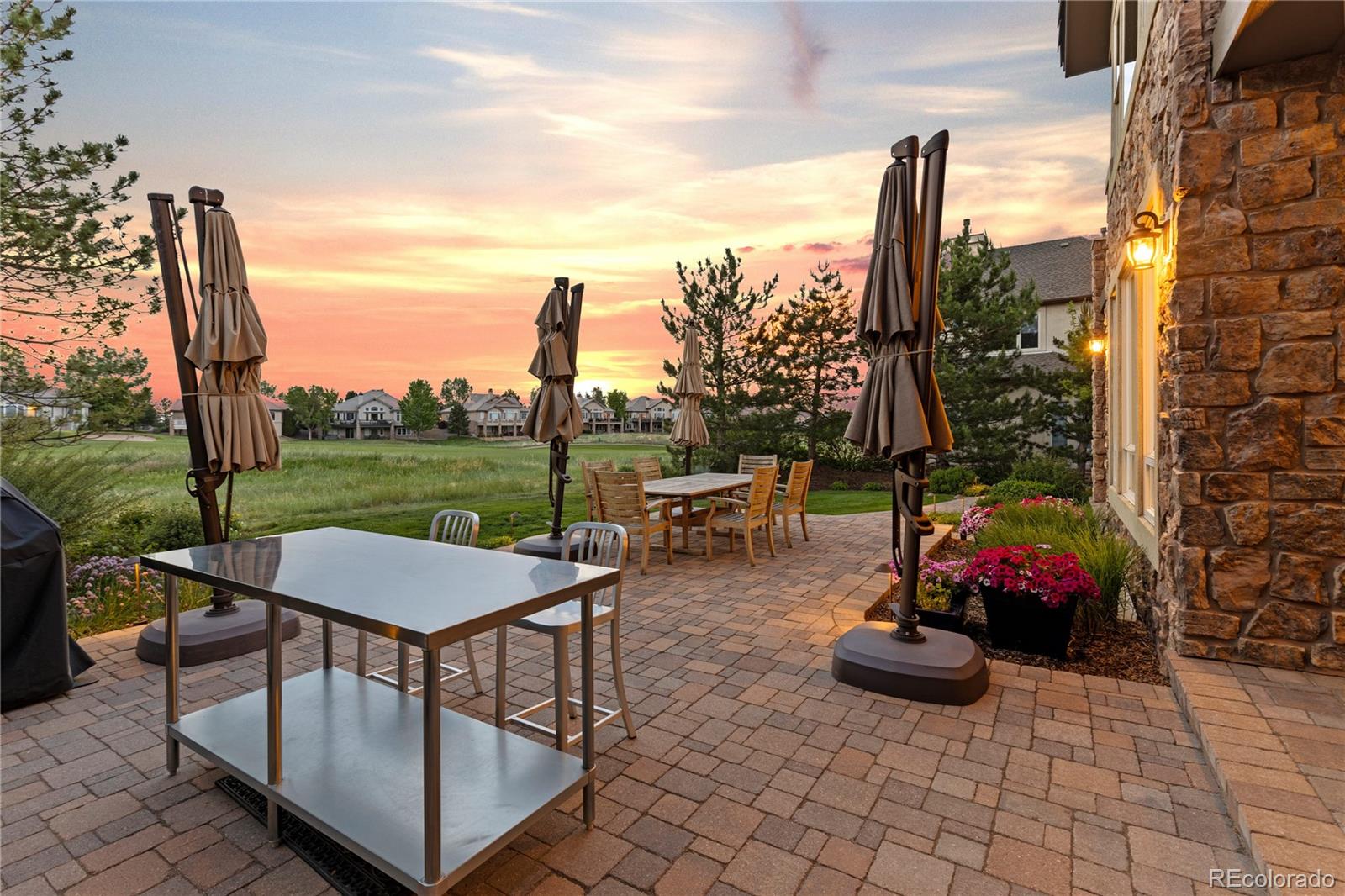 1291 Buffalo Ridge Road Castle Pines, CO 80108 - Photo 3 of 39 a view of outdoor space yard deck patio and outdoor kitchen
