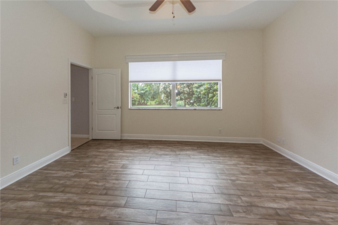 5952 Spanish River Road Fort Pierce, FL 34951 - Photo 12 of 35 an empty room with a window