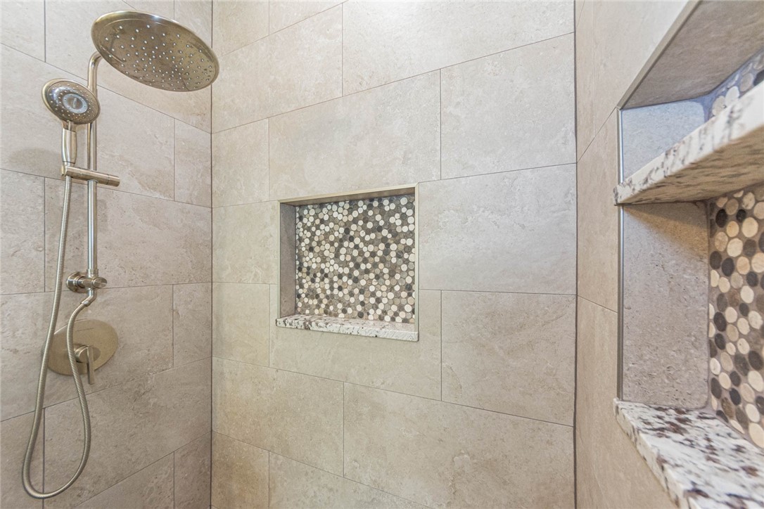 5952 Spanish River Road Fort Pierce, FL 34951 - Photo 16 of 35 a bathroom with a shower