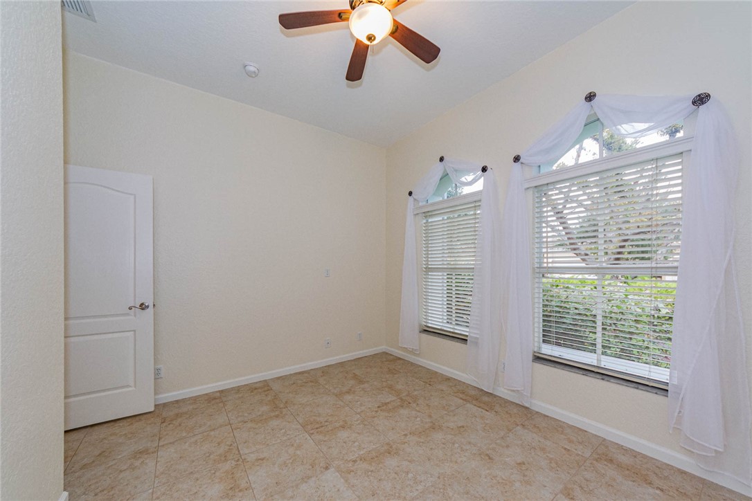 5952 Spanish River Road Fort Pierce, FL 34951 - Photo 18 of 35 a view of an empty room with a window