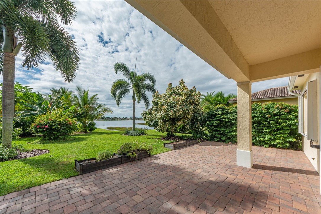 5952 Spanish River Road Fort Pierce, FL 34951 - Photo 26 of 35 a view of a garden with a fountain