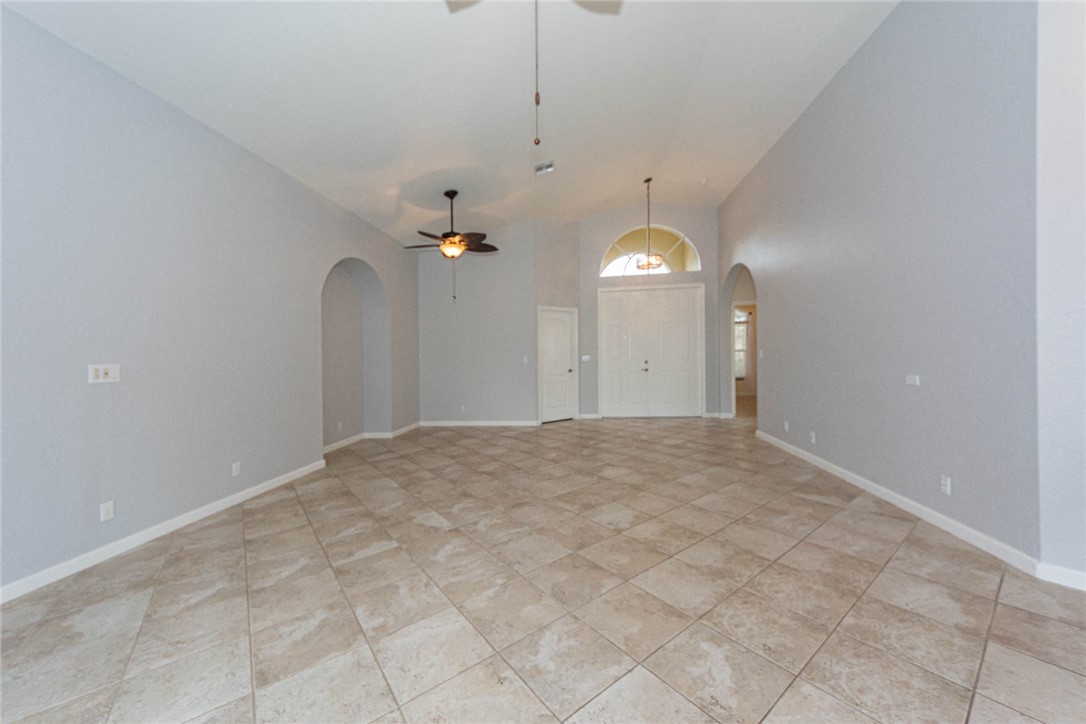 5952 Spanish River Road Fort Pierce, FL 34951 - Photo 5 of 35 a view of a room with a ceiling fan