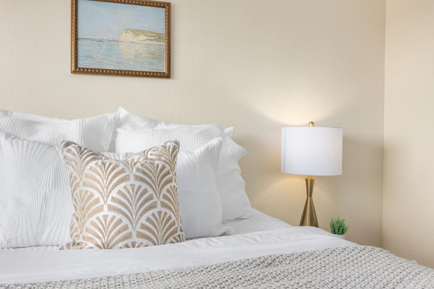 164 Weeks Drive Watsonville, CA 95076 - Photo 16 of 37 a bedroom with a white bed and a lamp