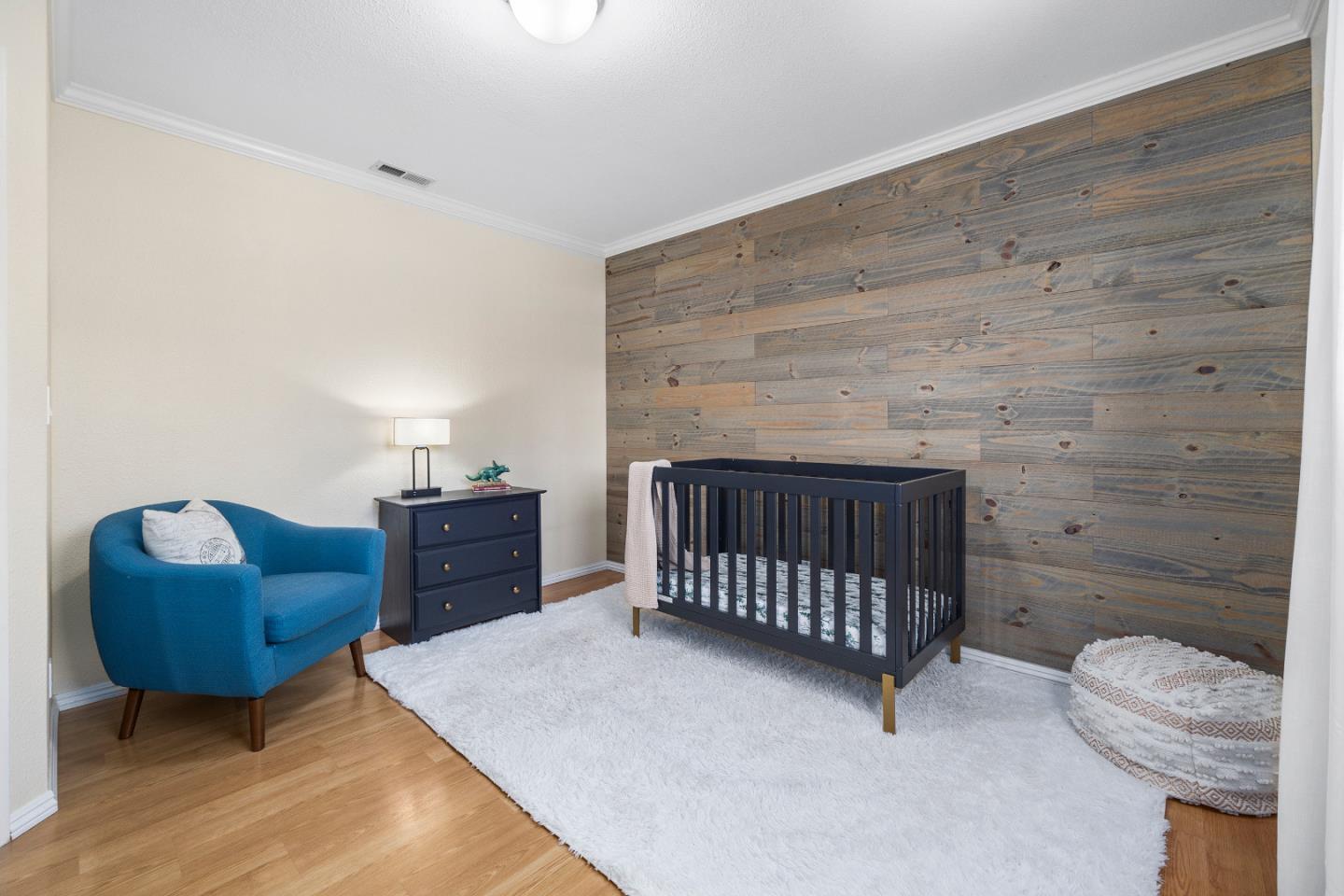 164 Weeks Drive Watsonville, CA 95076 - Photo 21 of 37 a bedroom with a bed and a couch