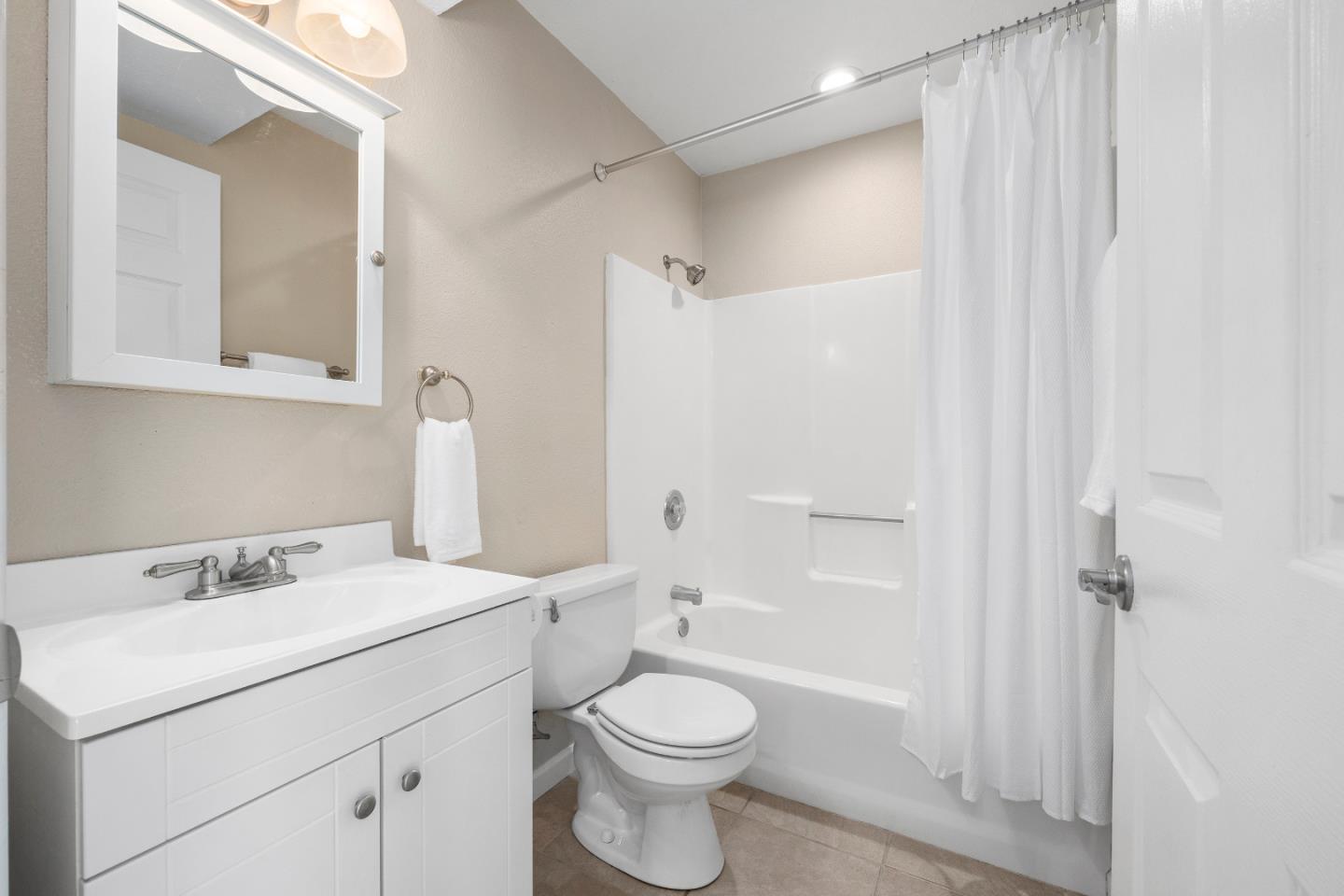 164 Weeks Drive Watsonville, CA 95076 - Photo 24 of 37 a bathroom with a sink toilet and shower