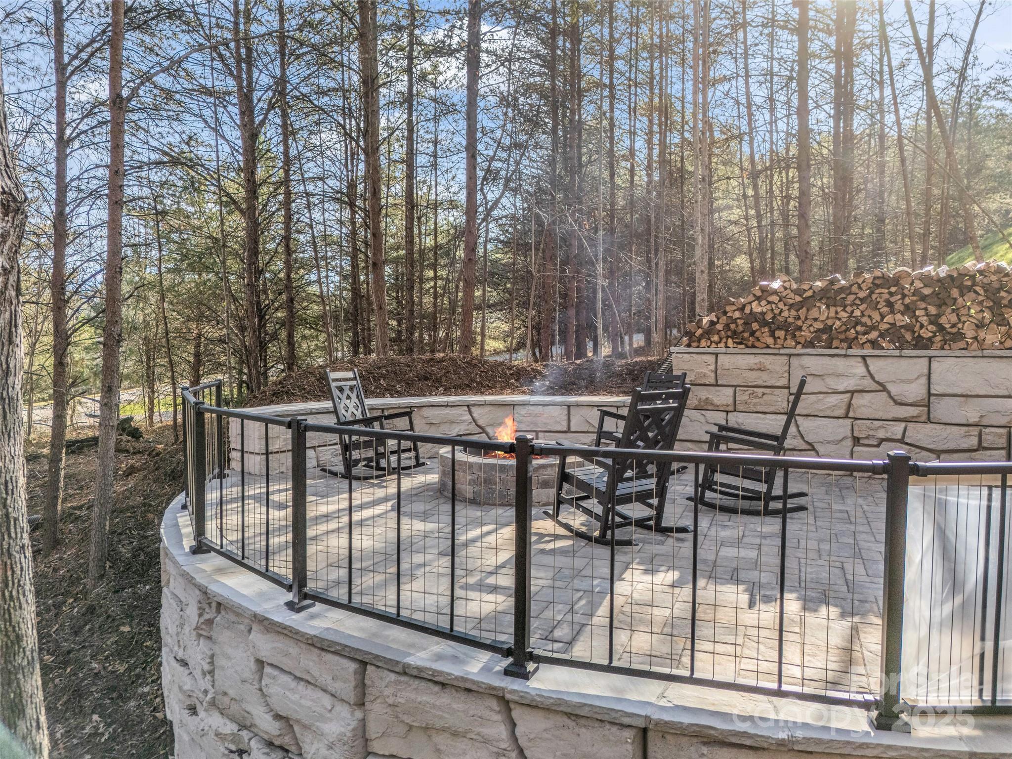 61 Deep Gap Farm Road East Mill Spring, NC 28756 - Photo 11 of 29 a view of outdoor space with seating area