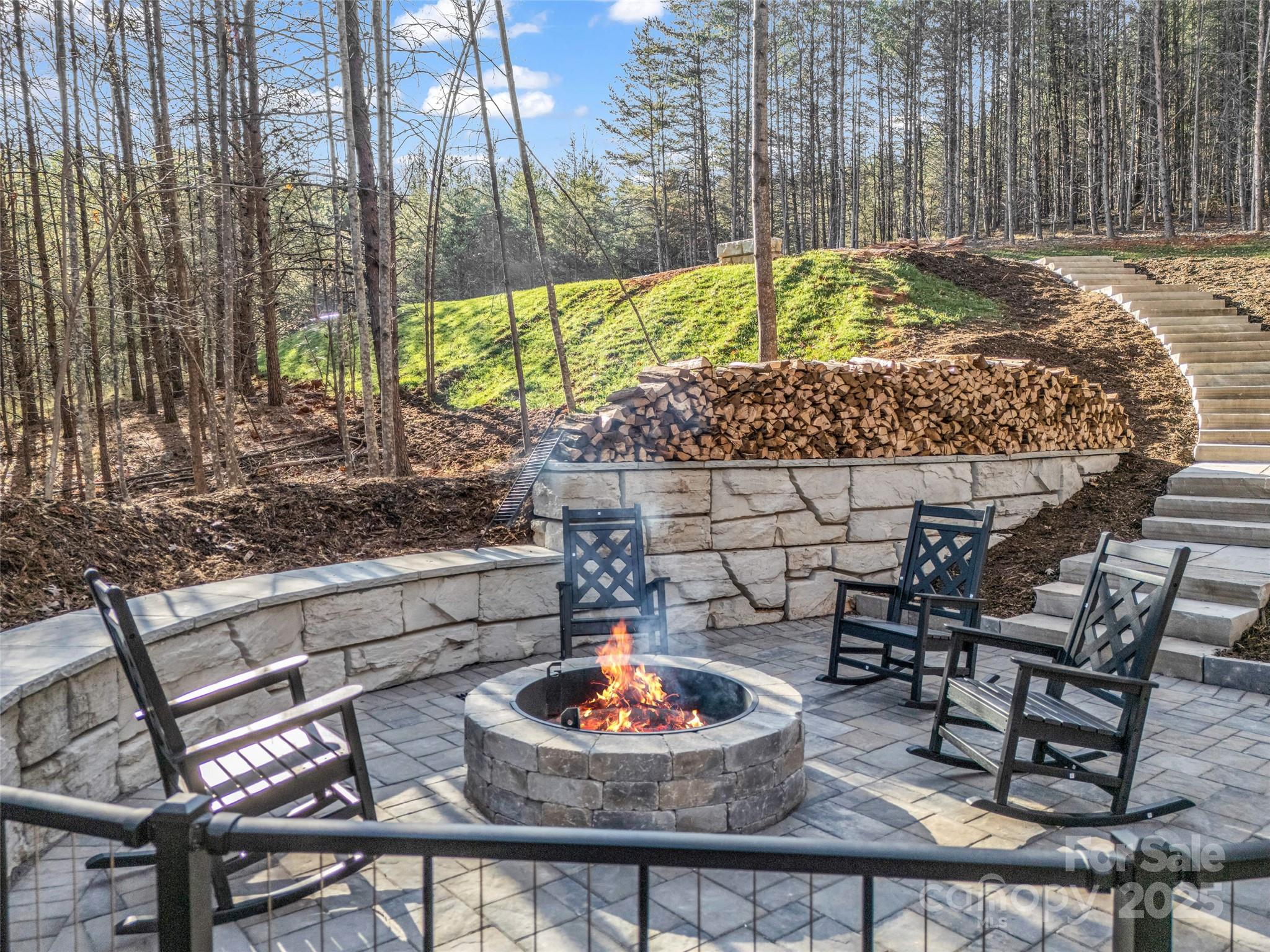 61 Deep Gap Farm Road East Mill Spring, NC 28756 - Photo 2 of 29 a outdoor view with a sitting space