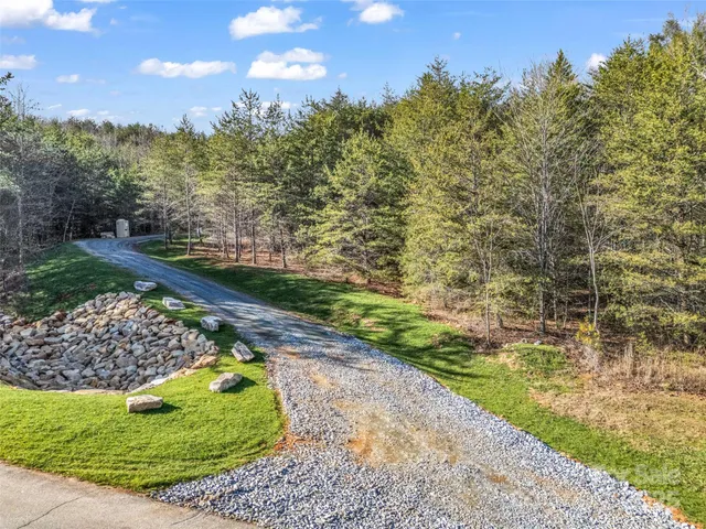 a view of a backyard of the house