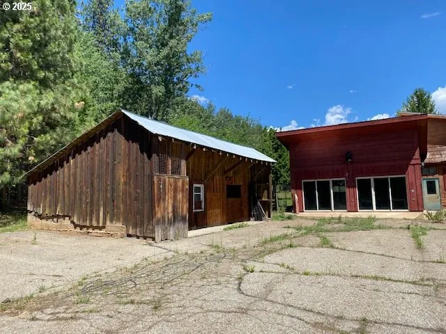 a backyard of a house with lots of green space