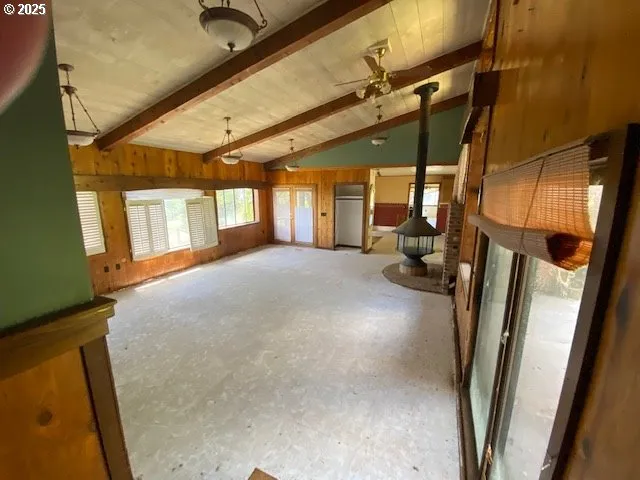 a view of a house with a yard and plants