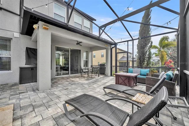 a outdoor space with lots of tables and chairs