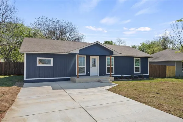 a view of house with yard and a outdoor space